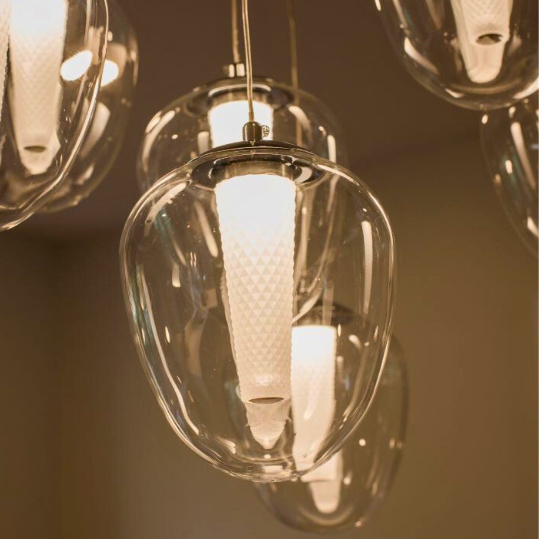 Close-up of a unique glass pendant light with a textured inner cone, part of a Hamilton kitchen remodel